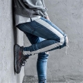 Distressed Knee Ripped Side Stripe Ankle Zipper Jeans